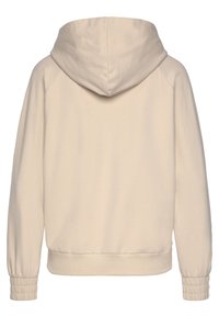 Hoodie in hellem Beige mit gemütlichem Schnitt, gerippten Bündchen und glatter Textur. Die Rückansicht zeigt ein schlichtes Design ohne Verzierungen.