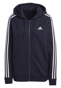 Marinblå Adidas zip hoodie med vit tre-stripes detaljering på ärmarna, framfickor, dragbandsluva och Adidas-logotyp på bröstet.