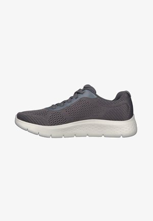 Gray athletic shoe with a breathable mesh upper, lace-up design, and a thick white rubber sole. Features a textured pattern on the surface.