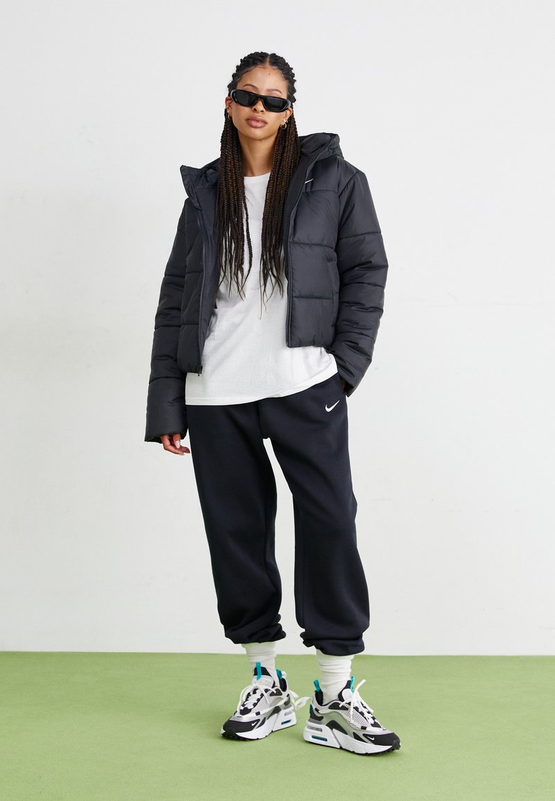 Nike Sportswear PANT Pantalones deportivos black/sail/negro