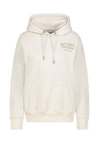 Crèmekleurige hoodie gemaakt van zachte stof, met een voorzak, verstelbare koordjes en bedrukte tekst: "MAAR EERST, MATCHA" en "Matcha Club."