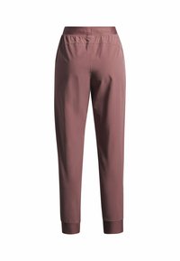 Elastische broek in een gedempt mauve kleur, gemaakt van een gladde stof met taps toelopende pijpen en ribgebreide boorden bij de enkels.