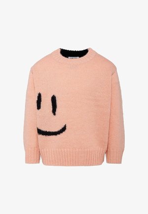 Roze trui gemaakt van zacht gebreid materiaal met een groot zwart glimlachend gezicht ontwerp op de voorkant, voorzien van geribbelde boorden en zoom.