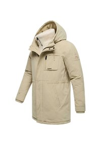 Bežs izolēts parka ar kapuci, ar rāvējslēdzēju priekšā un vairākām kabatām. Iezīmes mīksts, teksturēts iekšējais oderējums un regulējami auklas.