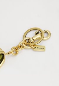 COACH PEAR BAG CHARM - Llavero - green