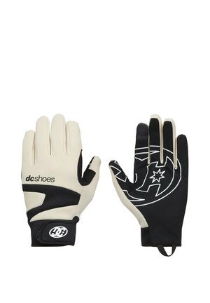 Pair of black and beige DC Shoes gloves, one showing back with logo and one showing palm with graphic design, on white background.