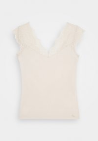 Kremowy top na ramiączkach z dekoltem w kształcie V i koronkowymi, krótkimi rękawami. Gładka tkanina z dopasowanym krojem. Dyskretny detal logo na dolnym brzegu.