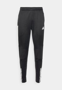 Schwarze Sporthosen mit einem elastischen Bund, versehen mit weißen Seitstreifen und Logo-Akzenten, taillierte Form und glatter Textur.