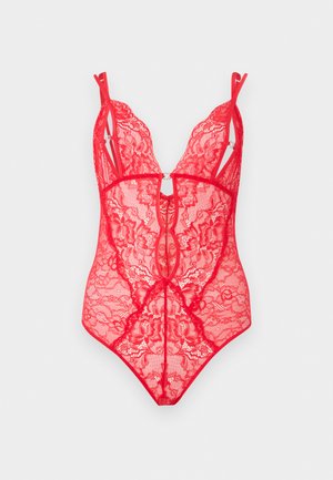 Body transparent en dentelle rouge avec motifs floraux, bretelles fines réglables et décolleté en V profond avec petits détails de découpe à l'avant.