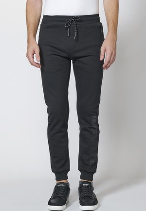 JOGGING  - Jogginghose - black