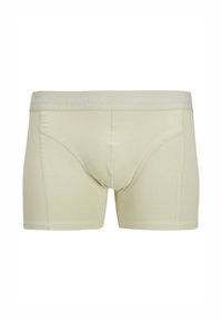 Lichtbeige herenboxers met een zachte tailleband met de tekst "originals studio". Gemaakt van rekbaar katoenen materiaal, met een gladde textuur.