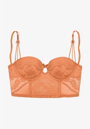 Koronkowy biustonosz balconette w kolorze brzoskwiniowym, z formowanymi miseczkami, regulowanymi ramiączkami, centralną ozdobą w postaci kokardy oraz koronkowymi detalami w kwiatowy wzór.
