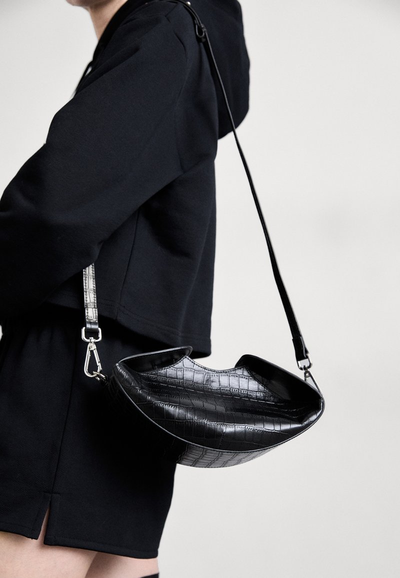 Geantă crossbody