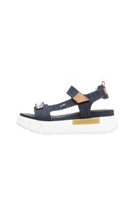 Sandal in denim con punta aperta, cinturini regolabili, dettaglio fibbia in argento e suola bianca spessa. Logo del marchio sul lato.