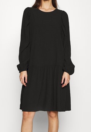 Vestido negro texturizado con mangas abullonadas largas, escote redondo y dobladillo acampanado. Fabricado con material ligero, ofrece un ajuste relajado.