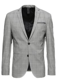 Grå rutigt kavaj med en skräddarsydd passform, insvängda lapeller, en knappstängning och bröstficka. Svart inre foder, texturerad tyg.