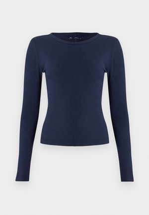 Marineblå ribbestrikket langermet topp med rund hals. Laget av et elastisk stoff, den har en tettsittende form og glatt tekstur.