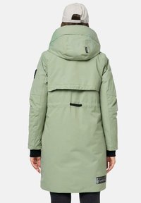 Green, padded parka with a large hood and back vent, featuring a logo patch and black accents on cuffs. Smooth texture, knee-length design.