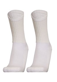 Weiße, gerippte Crew-Socken mit einer glatten, einfarbigen Spitze und Ferse. Hergestellt aus weichem Stoff und mit einem schlichten, klassischen Design.