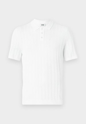 White short-sleeve polo shirt made of textured knit fabric, featuring a collar and three button placket, with fine vertical ribbing pattern.