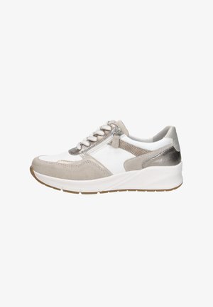 White and beige sneaker with thick sole, lace-up front, side zipper, and metallic accents on heel and near laces.