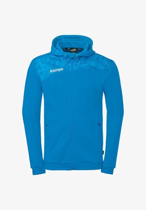 Blauwe hoodie met ritssluiting, geometrisch patroon op de schouders en het "Kempa"-logo op de linkerborst, voorzien van een capuchon en zijzakken.