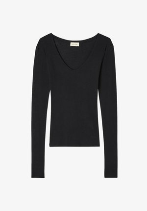 Must have kätised must peamiselt V-kaelusega, mis on valmistatud pehmest kangast. Omab sobivaid varrukaid ja sirget hemlit taljes.