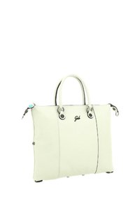 Borsa tote in pelle bianca con accenti neri, doppi manici superiori e dettagli in metallo rotondi. Presenta uno spazio interno per l'organizzazione.