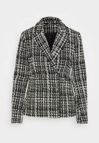 Černobílý kostkovaný blazer vyrobený z texturované tkaniny, s klopovým límcem, dvouřadým zapínáním a přiléhavým střihem.