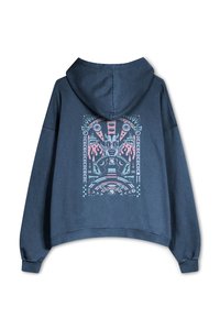 Sudadera cropped de color azul oscuro con un gran estampado gráfico colorido en la parte posterior, que presenta diseños abstractos, ojos y llamas. Tejido suave y texturizado.