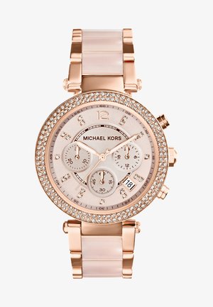 Zegarek chronograficzny Michael Kors z różowo-złotą kopertą, bezel zdobiony kryształami, jasnoróżową tarczą i różową bransoletą z tworzywa sztucznego.