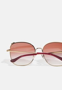 COACH Occhiali da sole - shiny rose gold-coloured/ burgundy