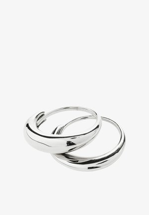 Two shiny silver hoop earrings with a smooth, slightly twisted design on a white background.
