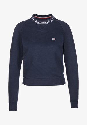 Marineblauwe sweatshirt van katoen; heeft een hoge hals met rode en witte gestreepte accenten en een klein logo op de borst. Ribgebreide manchetten.