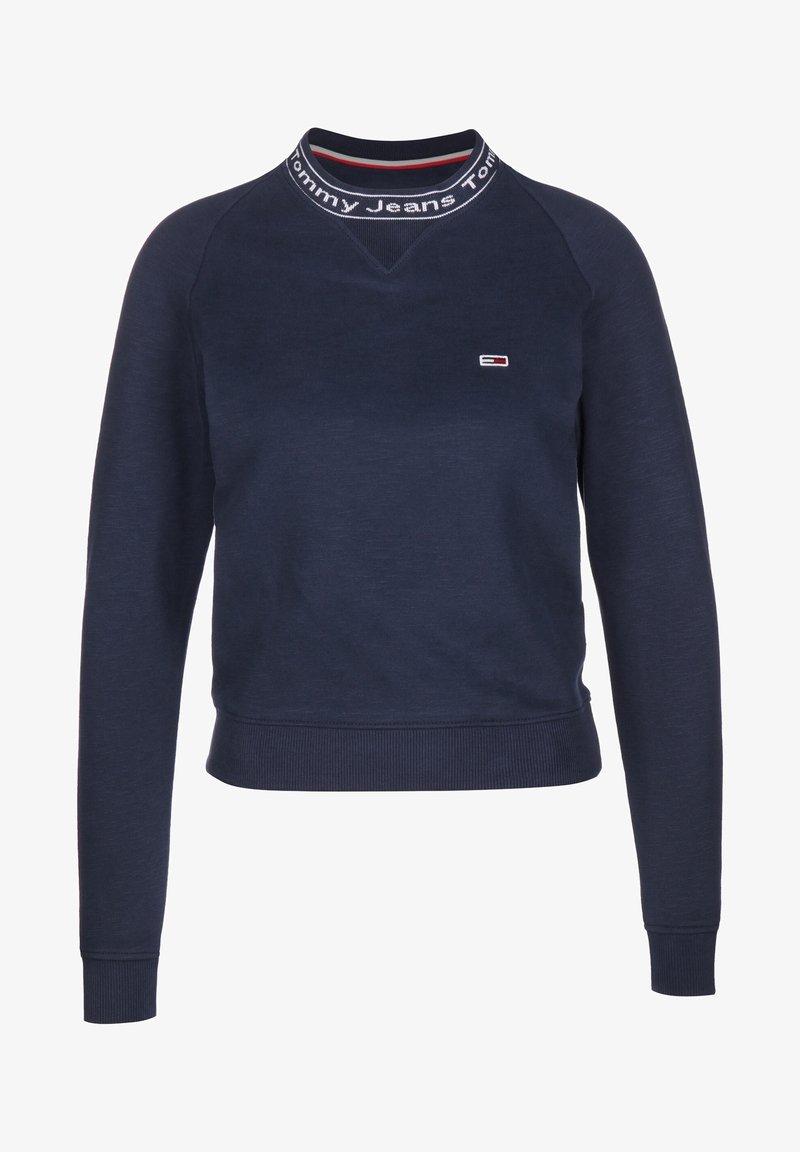 Navy blue sweatshirt made of cotton; features a high neckline with red and white striped accents and a small logo on the chest. Ribbed cuffs.