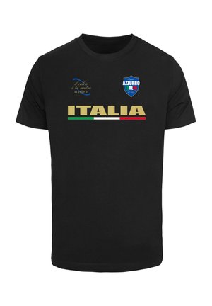 Black cotton t-shirt featuring "ITALIA" in gold, with green, white, and red stripes below. Logos and text in blue and gold above. Basic crew neck design.