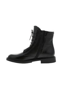 Bottes noires en cuir jusqu'à la cheville avec fermeture éclair, détails en dentelle et semelle plate. Texture lisse avec un minimum d'accents en métal.
