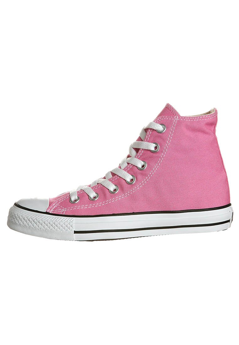 Rosa høyhælte kanvas sneakers med hvit gummisåle, hvite lisser, metalløyer og svart stripe detalj.