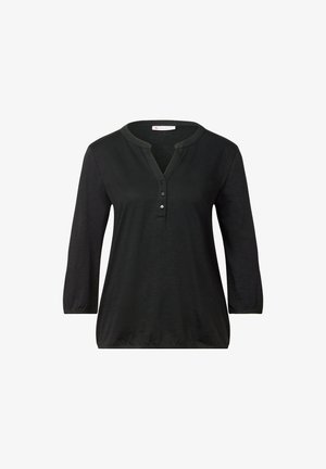 Schwarze Bluse mit langen Ärmeln, V-Ausschnitt, Knopfleiste mit drei Knöpfen sowie elastischem Saum und Bündchen.