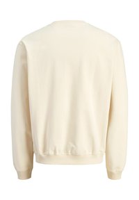 Cremefarvet sweatshirt med rund hals, lange ærmer og ribbede manchetter. Glat, blød tekstur uden synlige designs eller mønstre.