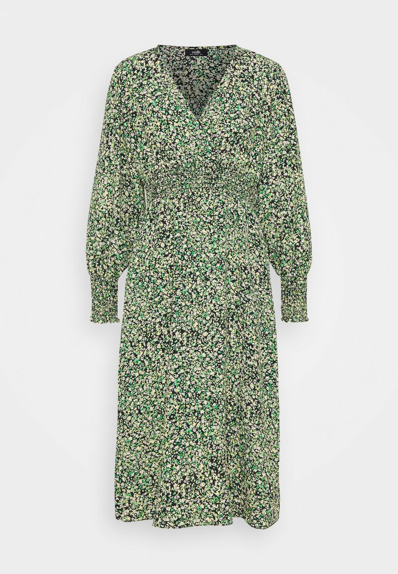 Robe midi à manches longues avec imprimé floral vert et blanc, encolure en V, taille froncée et poignets smockés aux manches.