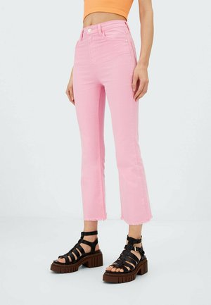 Flared Jeans - mottled pink