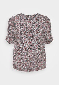Blusa floral con mangas cortas abullonadas. Base negra con pequeñas flores rosas, azules y blancas. Cuello redondo y corte holgado. Tejido ligero.