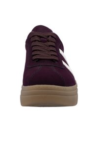 Burgundy suede sneaker with brown laces and white side accents, featuring a textured gum sole and stitched detailing on the upper.