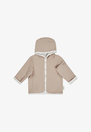 Béige hooded jacket with snap closures, white accents, and a cat illustration on the sleeve. Soft fabric with a smooth texture.