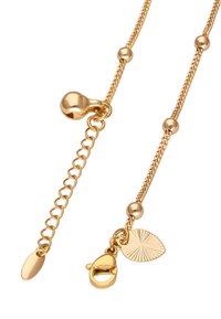 Zlatem tónovaný řetízek s kulatými korálky, dekoračním přívěskem ve tvaru listu s texturovaným designem a zapínáním na karabinku.