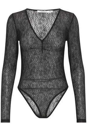 Bodysuit en dentelle noire avec des manches longues, décolleté en V et texture transparente. Présente des détails froncés au niveau de la poitrine et des ouvertures de jambes classiques.