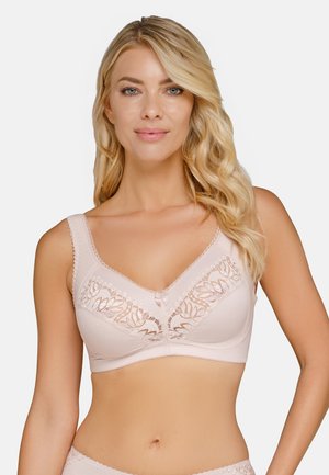 Lace-trimmed, light pink bra with wide straps and a V-neckline. Features floral patterns and a small bow detail at the center. Smooth fabric.