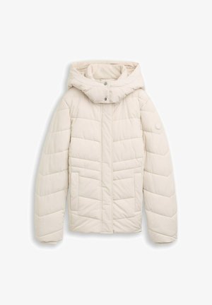 Heledbeez puffer jakk, millel on kapuuts, tikanddisain, eesne tõmbelukk, kaks külgtaskut ja ringikujuline logo vasakul varrukal.