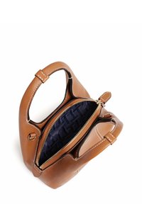 Brown leather handbag with dual handles and a zipped closure, featuring a navy patterned interior lining and white stitching accents.